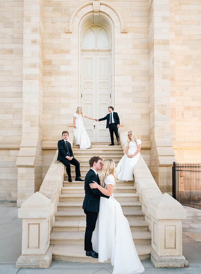 Wedding couples photographed on the steps of the Manti Utah Temple